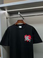 Black short-sleeve T-shirt with red and white horse emblem at center chest