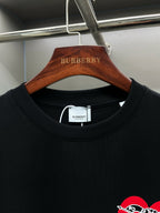 Black crew-neck short-sleeve T-shirt with Burberry logo at chest