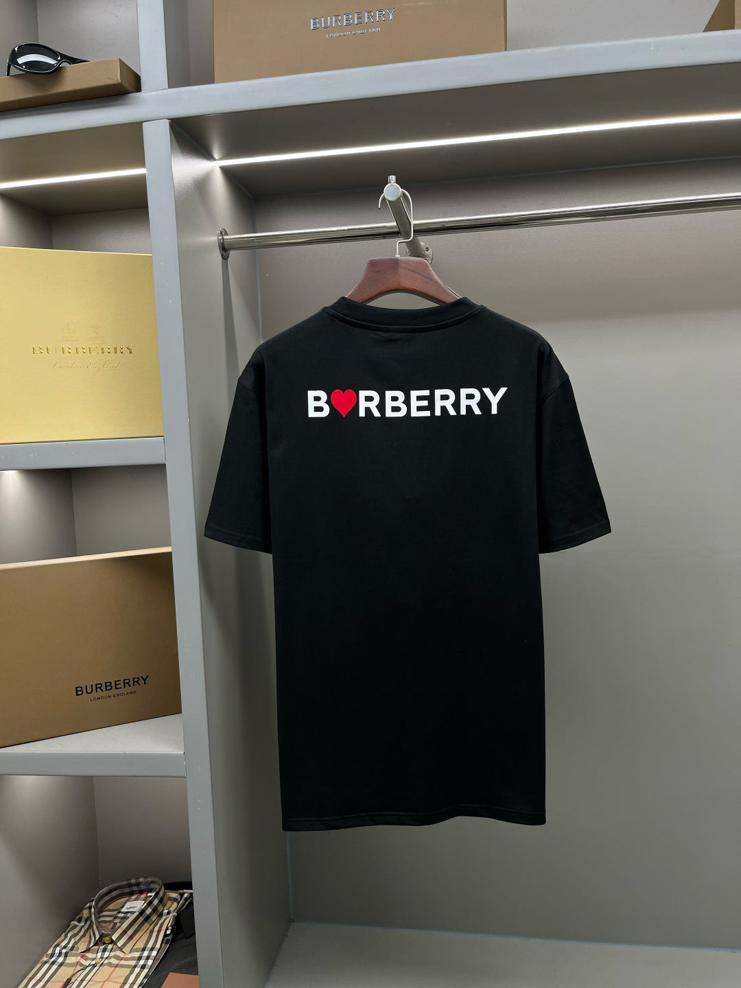 Black short-sleeve T-shirt with BORBURRY logo on upper back
