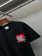 Black short-sleeve T-shirt with red and white horse emblem on chest