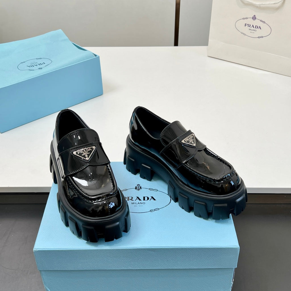 Black patent leather loafers with chunky platform sole, side buckle, unisex style