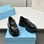 Black patent leather loafers with chunky platform sole, side buckle, unisex style