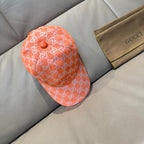Orange GG monogram baseball cap with round snap button and curved brim