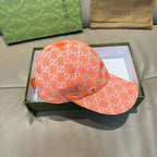 Orange GG monogram baseball cap with curved brim and crown panel stitching