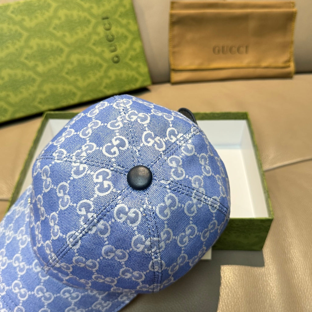 Gucci GG canvas baseball cap in blue with round button front panel