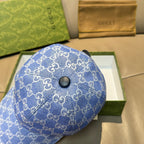 Gucci GG canvas baseball cap in blue with round button front panel