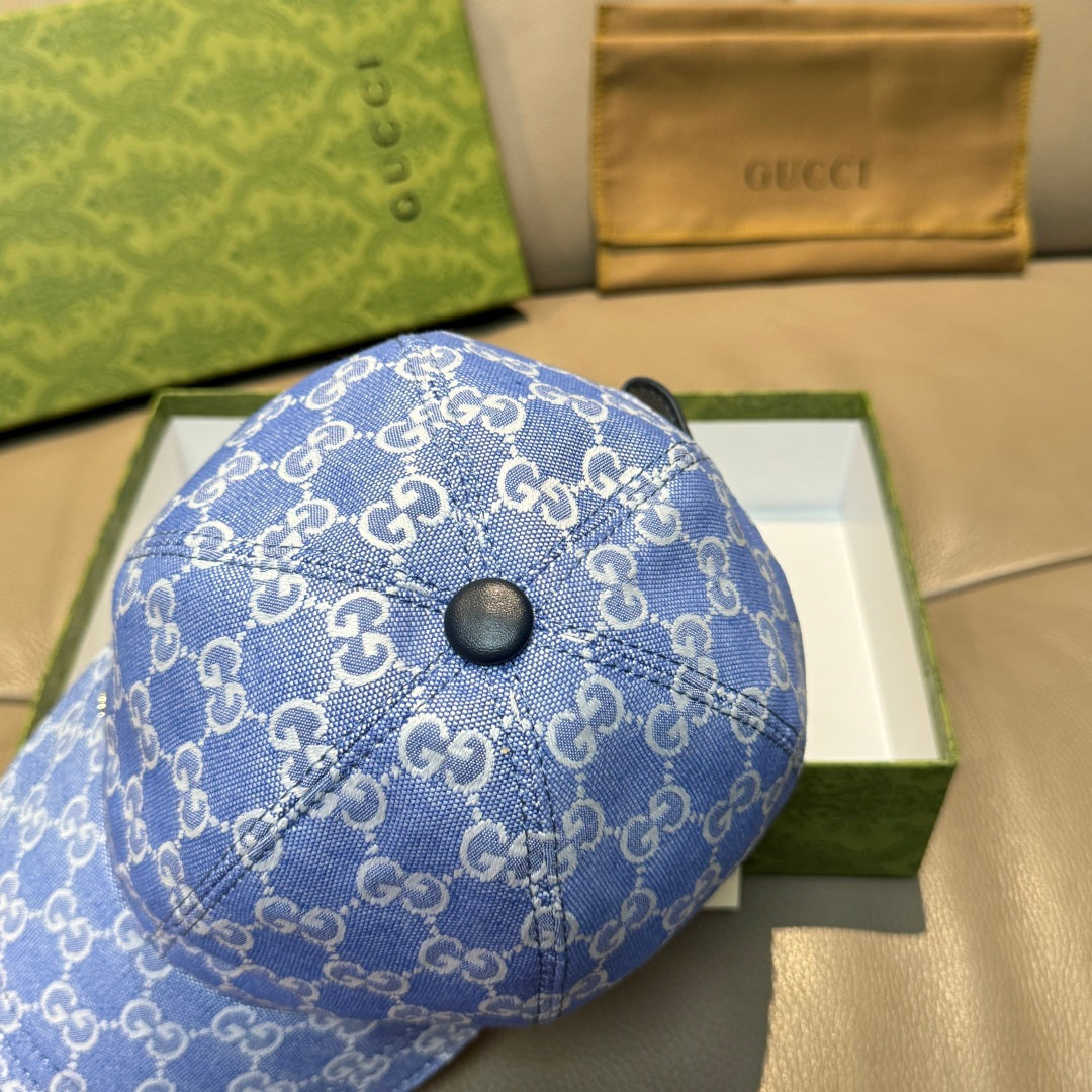 Gucci GG canvas baseball cap in blue with round button front panel