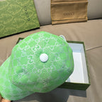 Gucci GG-print green baseball cap with top button and stitched seams