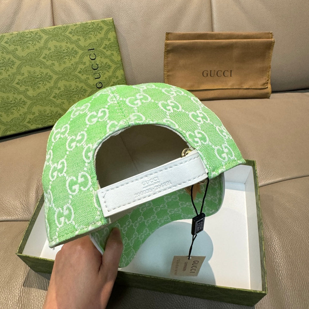 Gucci GG-print green baseball cap with white adjustable strap
