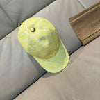 Gucci cap yellow with white GG monogram, adjustable strap and small metal button