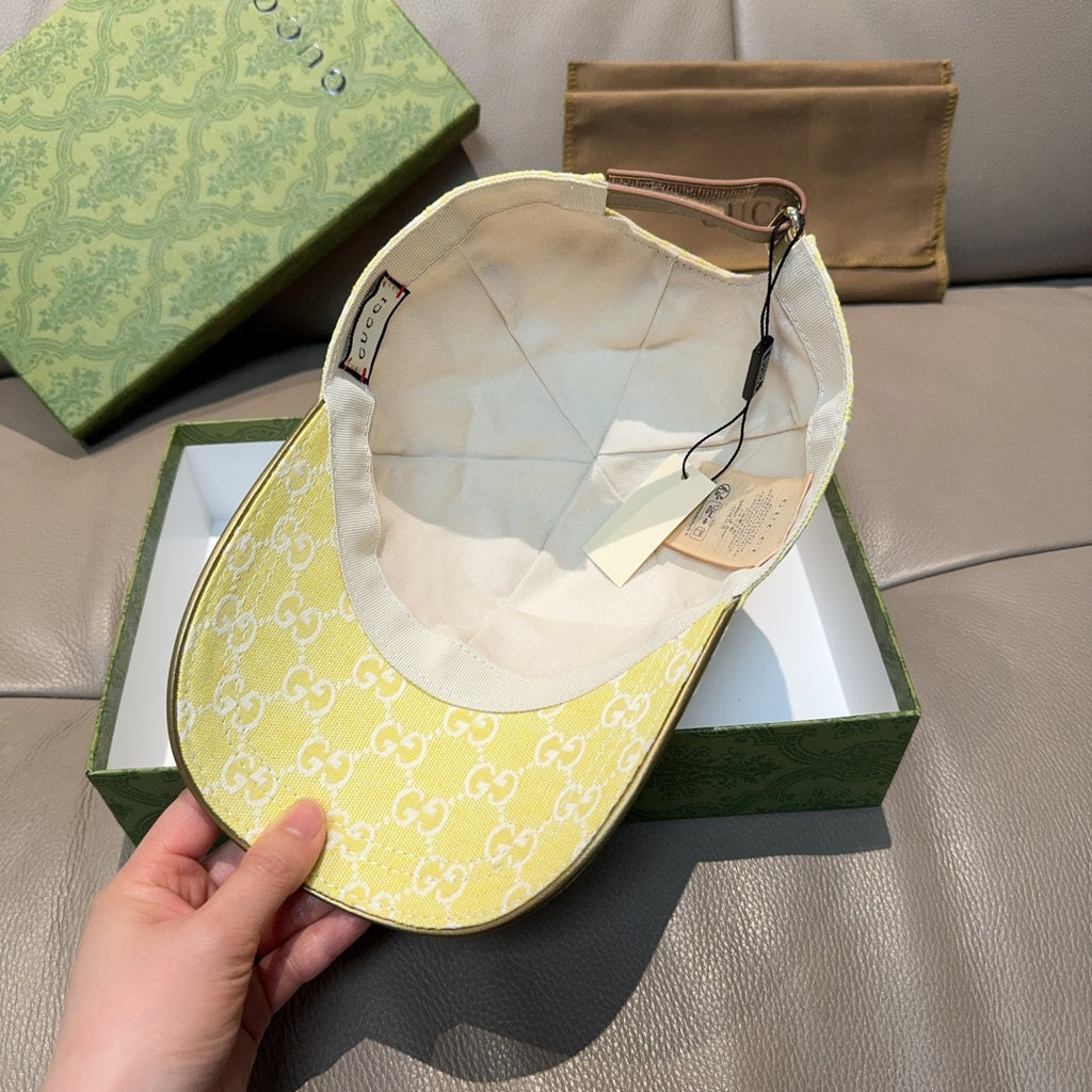 Gucci cap yellow with white GG monogram, interior lining and underside view