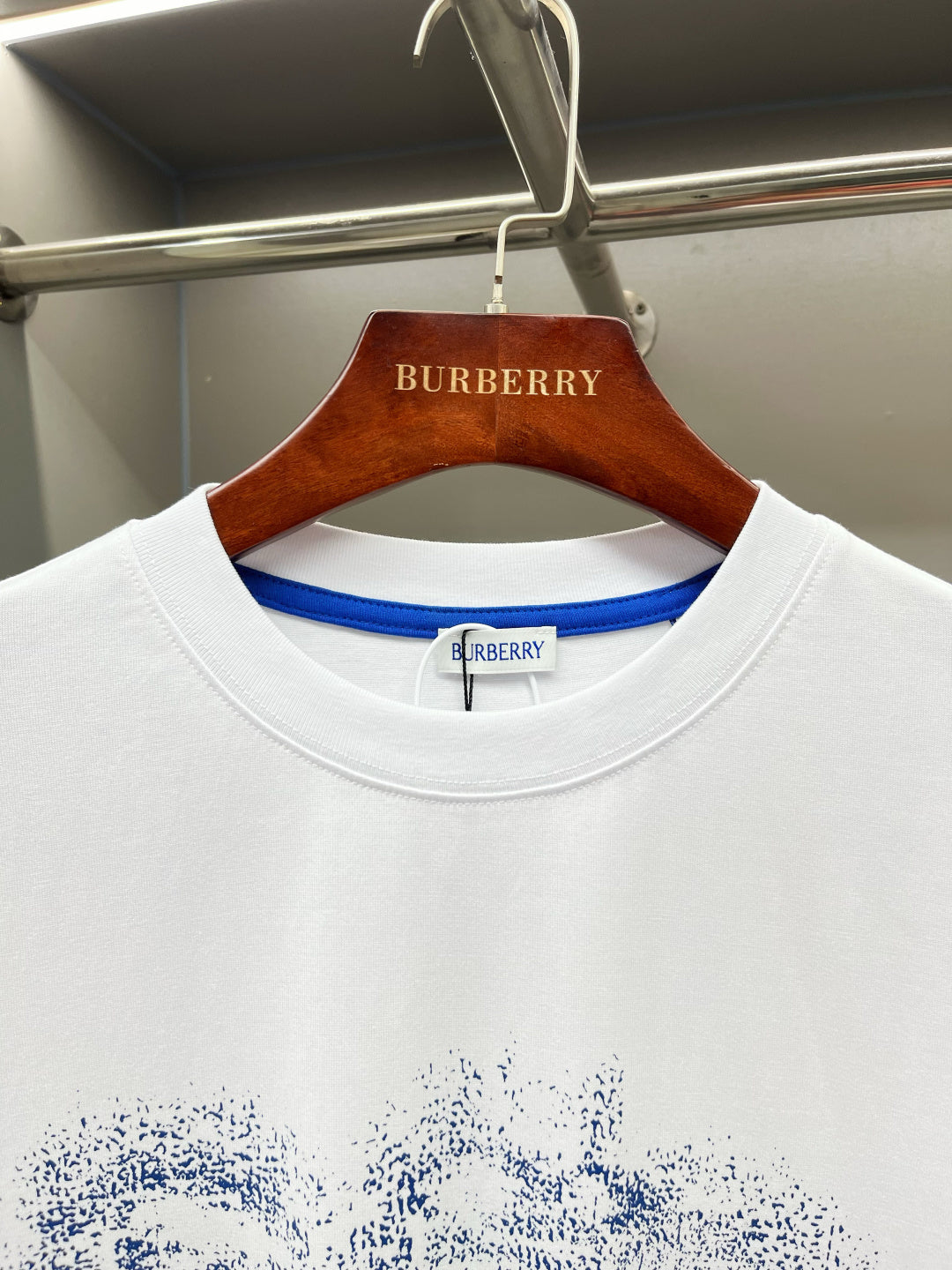 White short-sleeve T-shirt with blue-trim crewneck and Burberry neck label