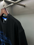 Black Burberry T-shirt side view with blue graphic print