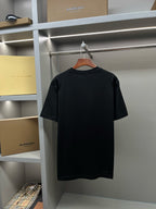 Black Burberry T-shirt on hanger, plain back view