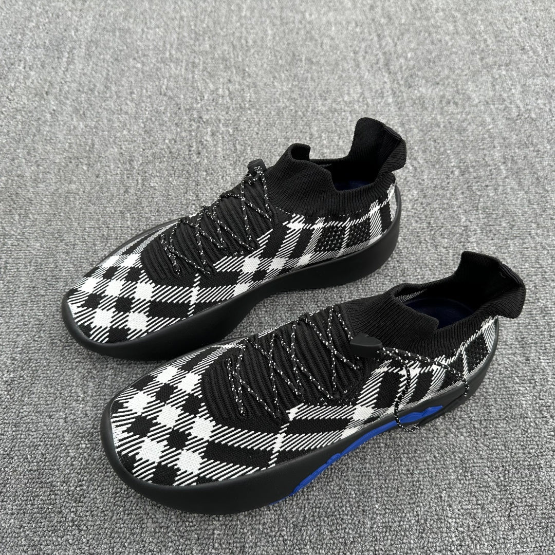 Burberry check knit sneakers with black sock collar and textured black rubber sole