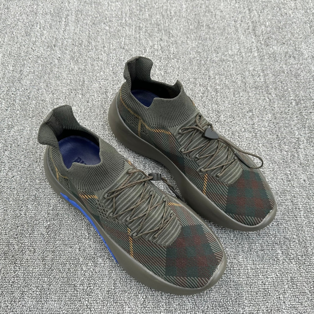 Pair of plaid knit sneakers, lace-up with padded collars and blue heel trim