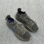 Pair of plaid knit sneakers, lace-up with padded collars and blue heel trim
