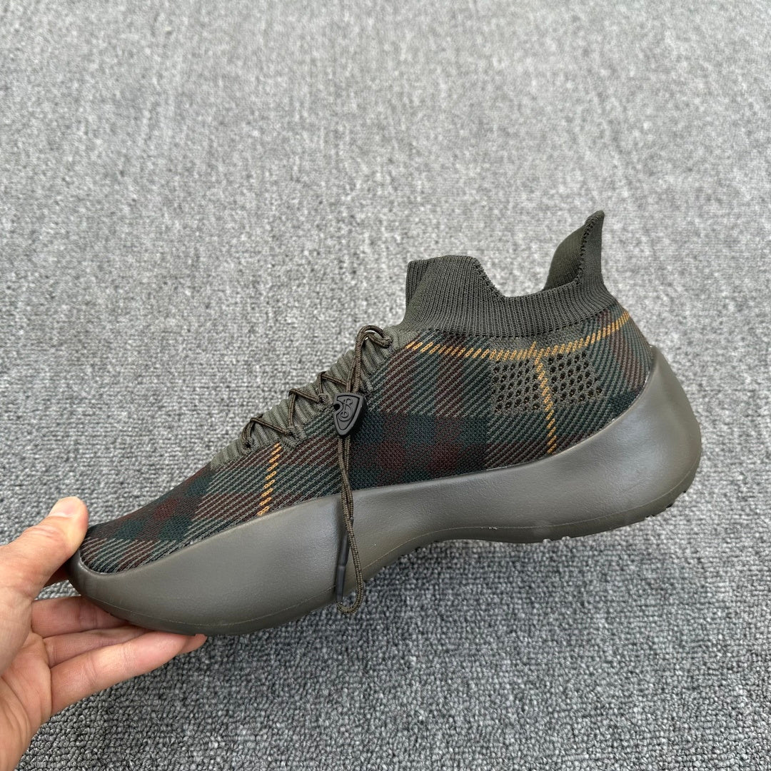 Lace-up plaid knit sneaker with blue sole trim, side view