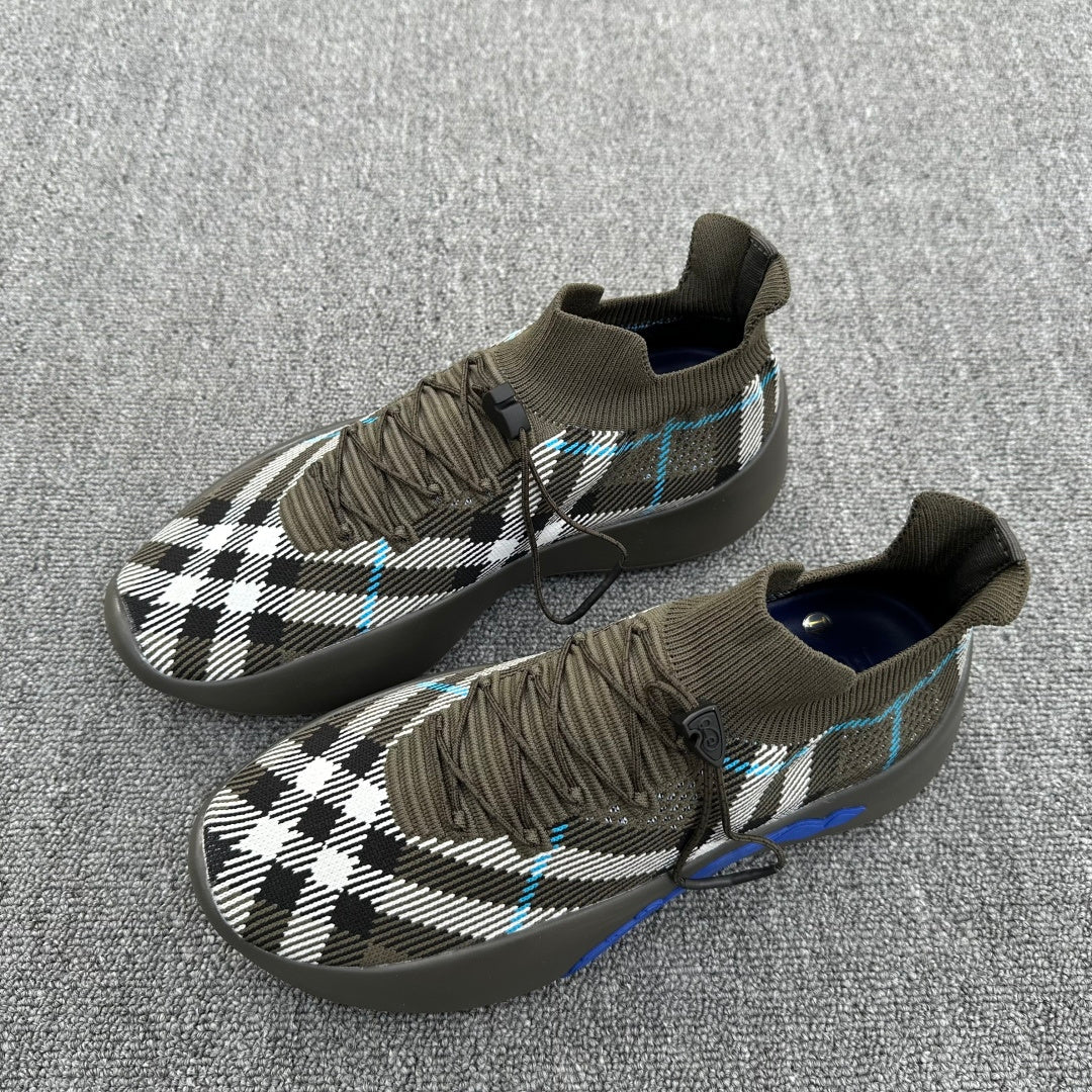 Sneakers with olive knit upper, black-and-white check plaid, blue accents, lace-up