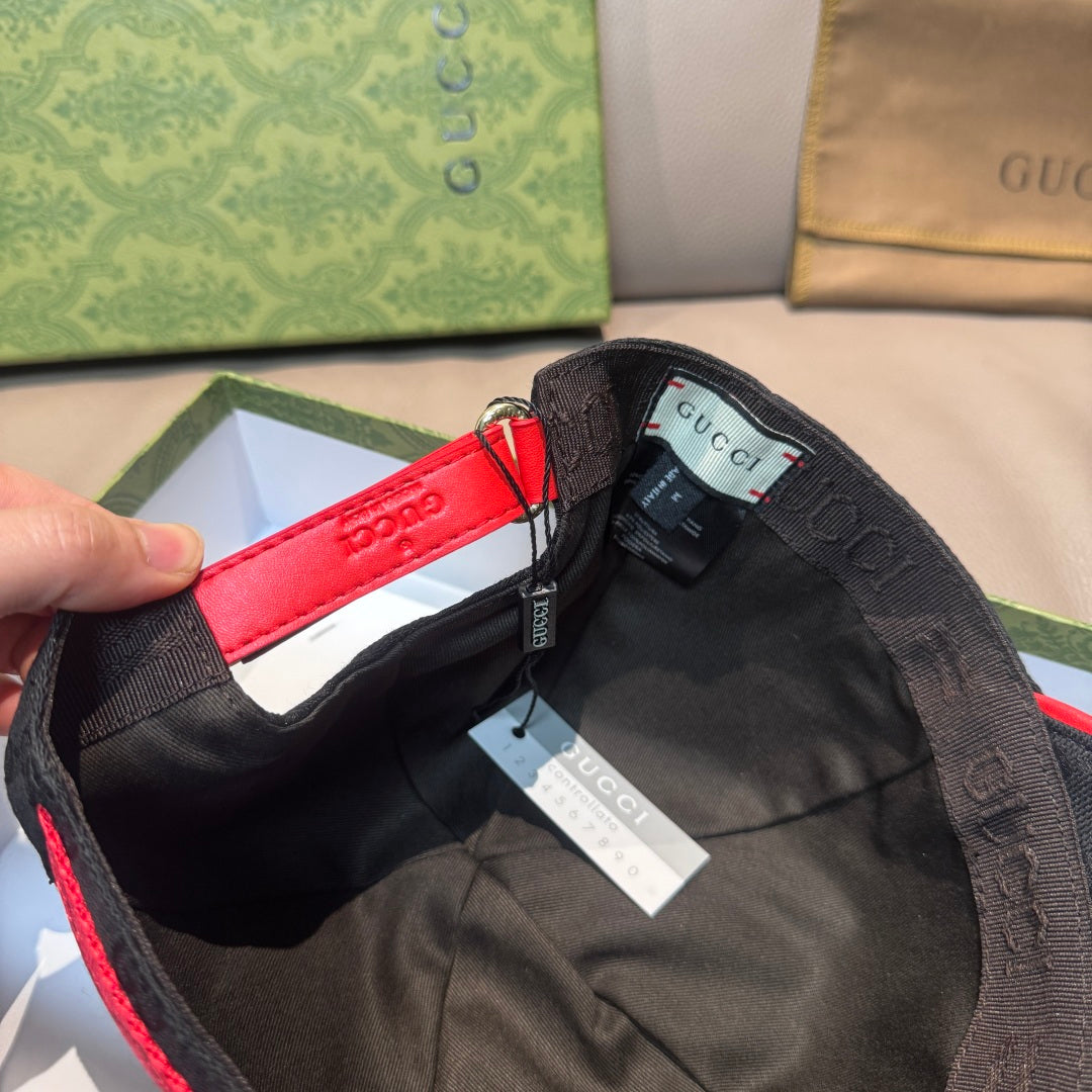Gucci baseball cap interior lining in dark fabric with hanging tag and inner label.