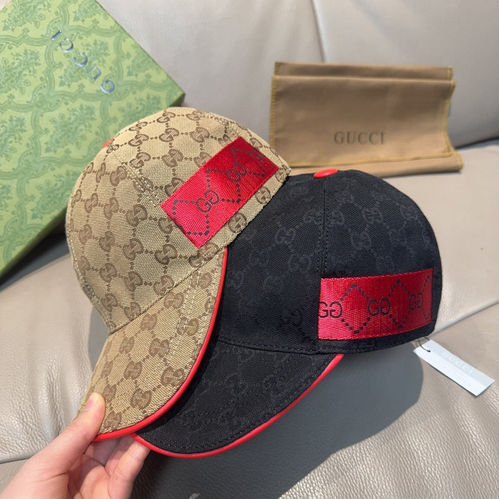 Gucci beige and dark navy baseball caps with red GG logo accents