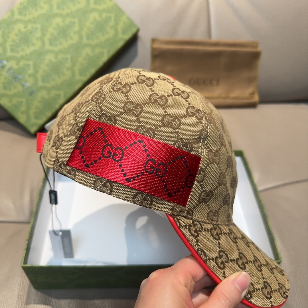 Gucci baseball cap viewed from side, showing GG monogram texture and red patch detail.
