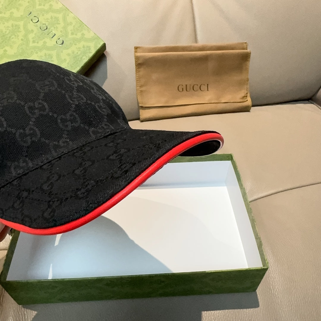 Gucci dark navy baseball cap showing red underside brim trim