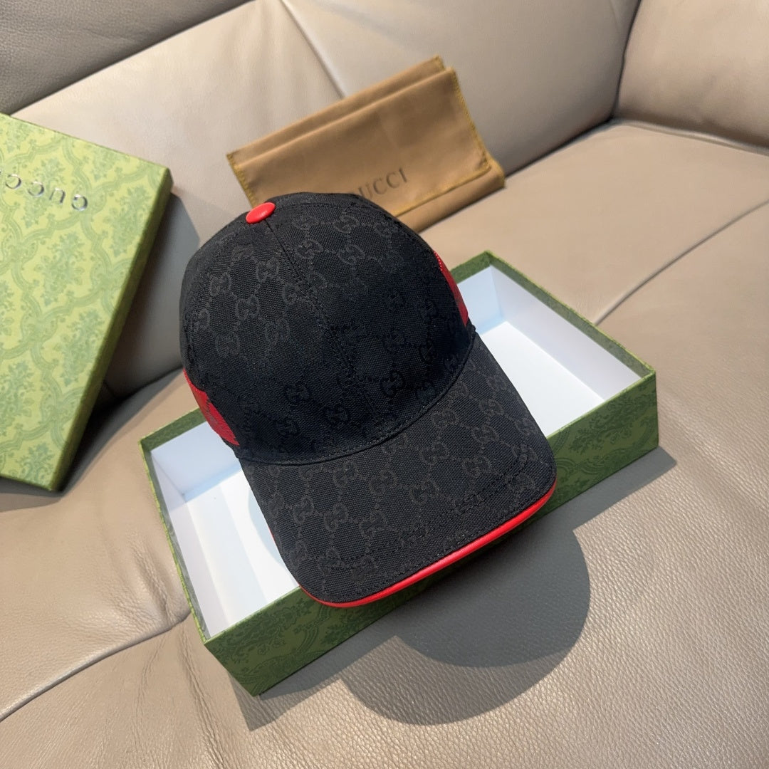 Gucci dark navy baseball cap with GG pattern and red brim trim