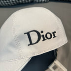 Dior cap in white canvas with large Dior logo on front.
