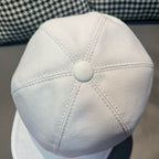 Dior cap in white canvas with round top button and stitched vent panels.