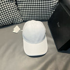 Dior cap in white canvas, back view with curved brim and small top button.
