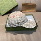 Gucci GG-pattern baseball cap, beige fabric with multicolor logo pattern and curved brim.
