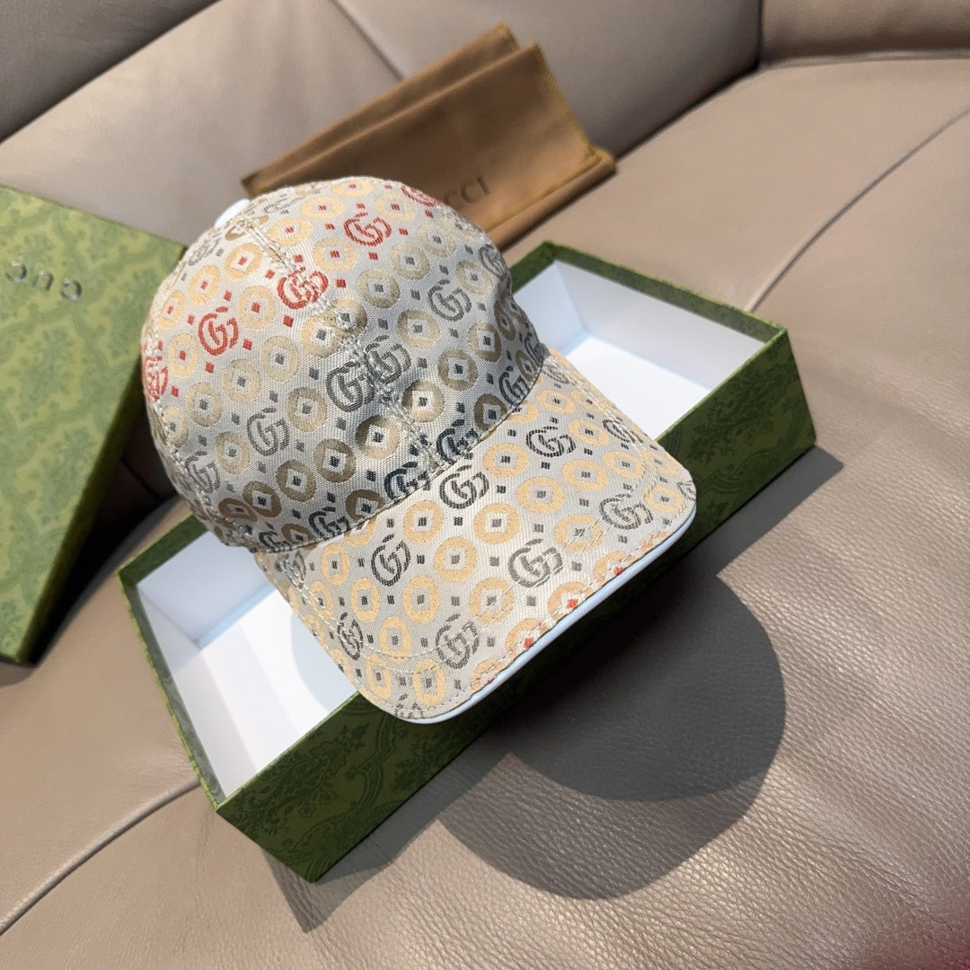 Gucci GG-pattern baseball cap, beige base with multicolor logo motifs and curved brim.