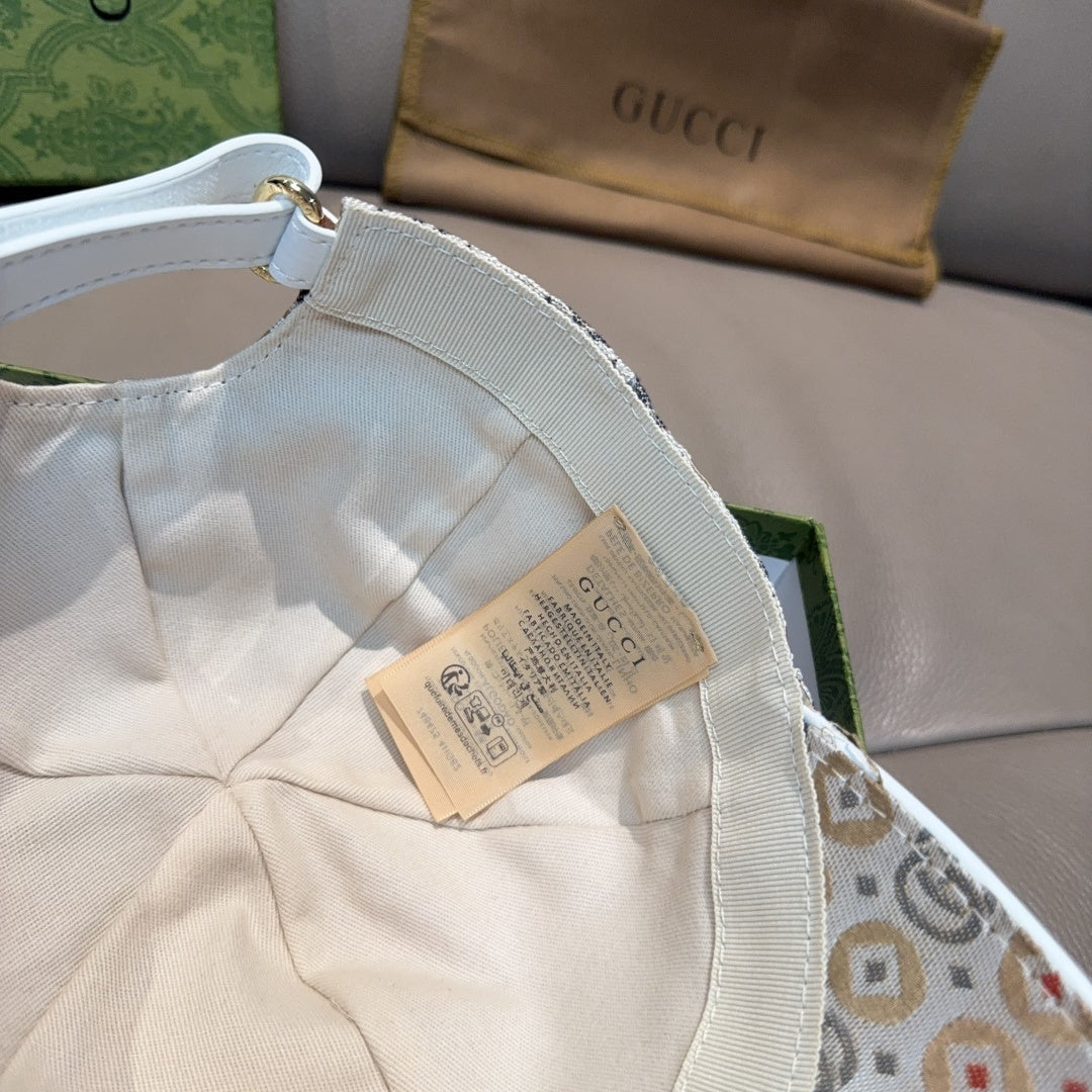 Gucci baseball cap interior, white strap and fabric label on GG-patterned lining.