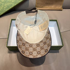 Monogram baseball cap showing white interior lining and adjustable strap