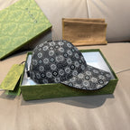 Gucci cap in dark gray with GG monogram pattern and curved brim