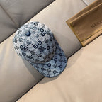 Gucci GG-pattern cap in blue-gray with dark button on crown