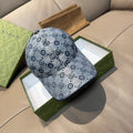 Gucci GG-pattern cap in blue-gray with curved brim and logo print