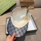 Gucci GG-pattern cap interior with cream lining and navy adjustable strap