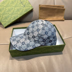 Gucci GG-pattern cap in blue-gray with curved brim, laid flat