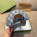 Gucci GG-pattern cap side view with navy adjustable strap