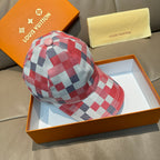 Louis Vuitton checkered baseball cap, red/blue plaid, angled view