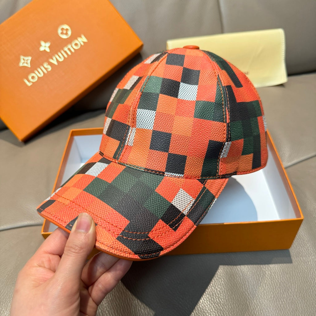 Orange, green, black, and white plaid baseball cap with curved brim