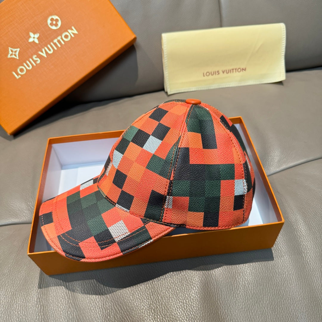 Plaid baseball cap in orange, green, black, and white with LV monogram patch