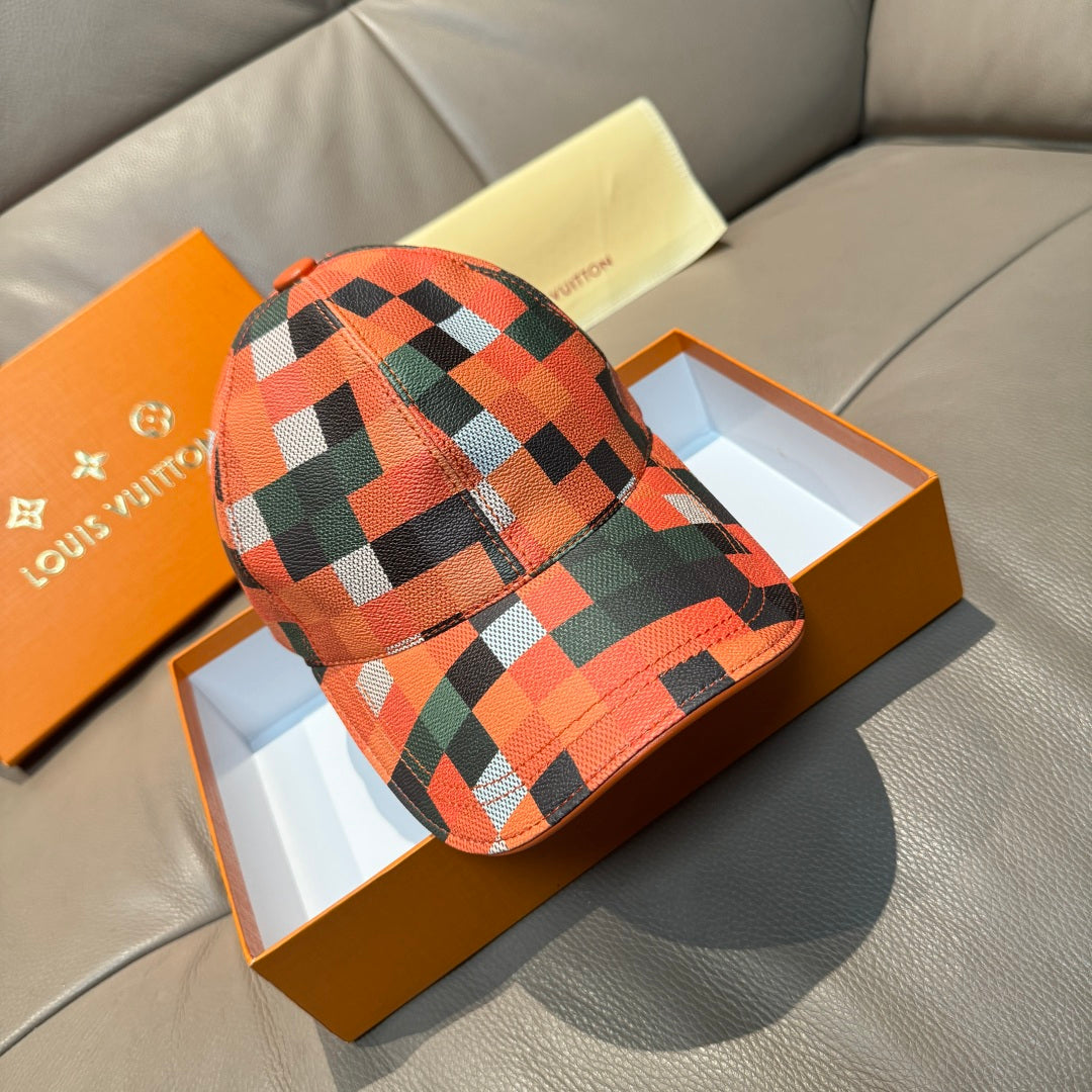 Baseball cap in orange, green, black, and white plaid with curved brim