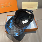 Louis Vuitton checkered cap with black lining and adjustable strap