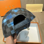 Louis Vuitton checkered cap showing interior panel and curved brim
