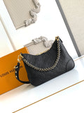 Louis Vuitton black monogram shoulder bag with gold chain and zipper closure