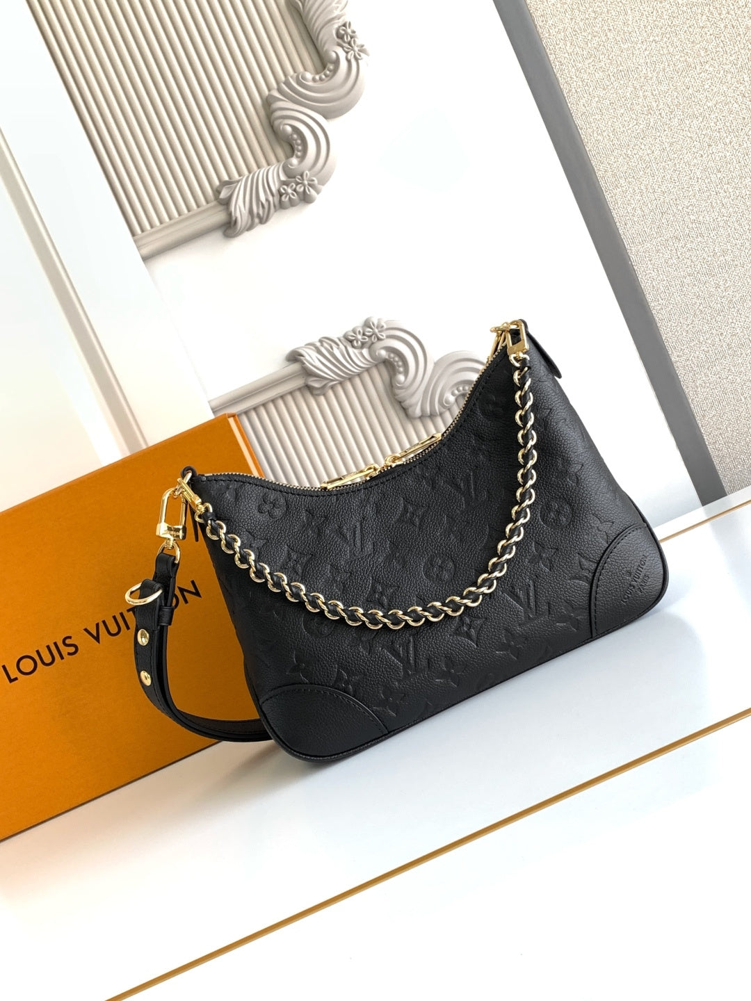 Louis Vuitton black monogram shoulder bag with gold chain and zipper closure
