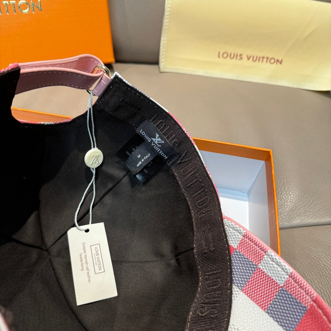 Black cap liner with Louis Vuitton hang tag and pink check brim